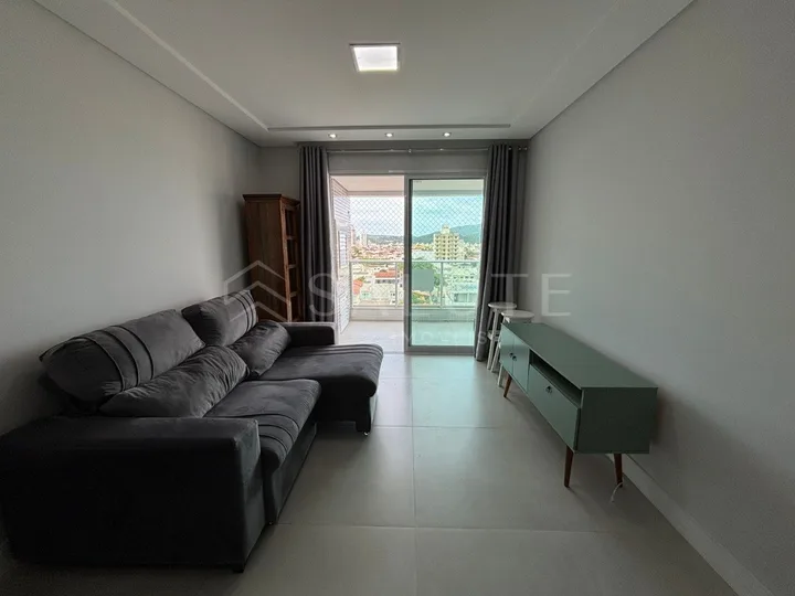 Apartamento aluguel anual 2 suites no Centro.