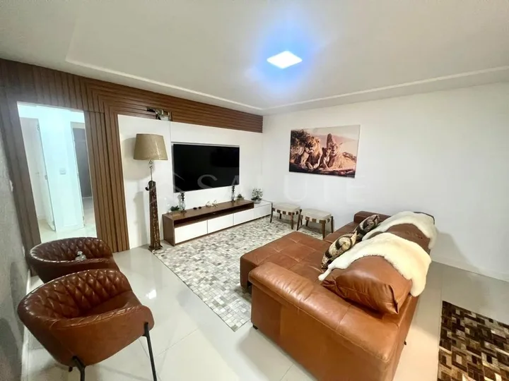 Apartamento com 4 suítes e churrasqueira a gás.